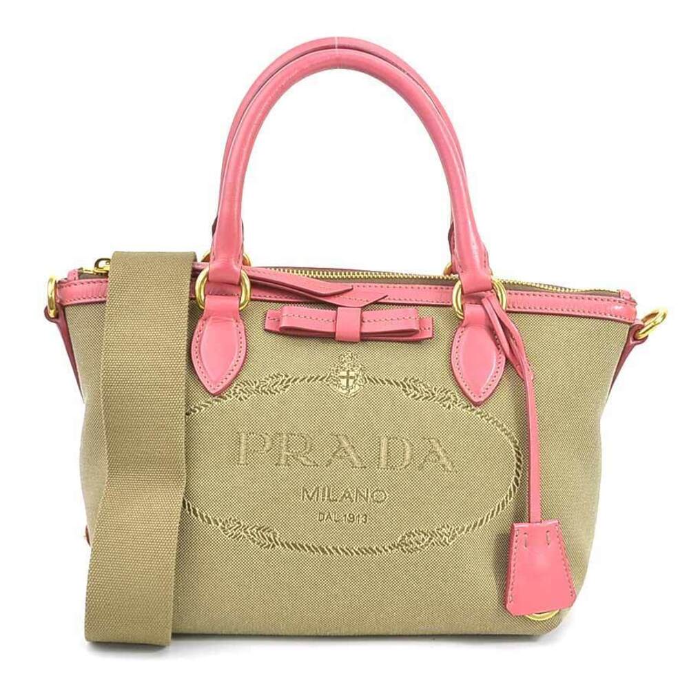 Prada Logo Jacquard Handbag tan canvas body pink leather